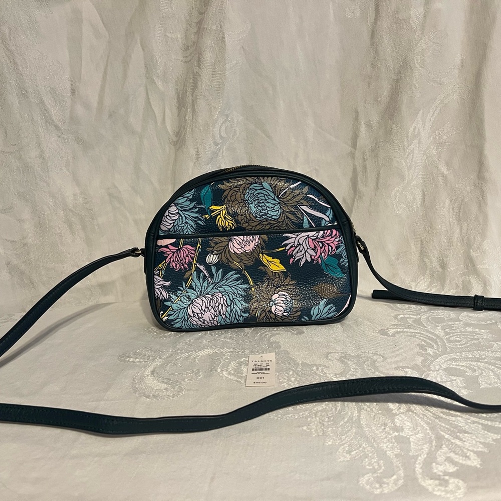 Talbots floral on navy leather shoulder bag. Slim exterior pocket perfect for